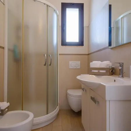 Апартаменты Scoglio *